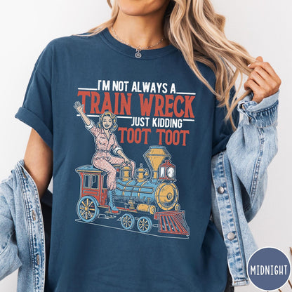 Comfort Colors tee in Midnight featuring vintage pin-up style graphic of a woman riding a steam train