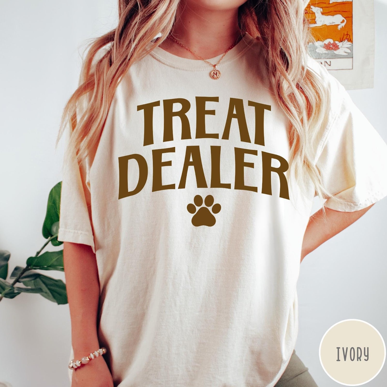 Comfort Colors tee in Ivory featuring dog owner design with Treat Dealer text and a paw print