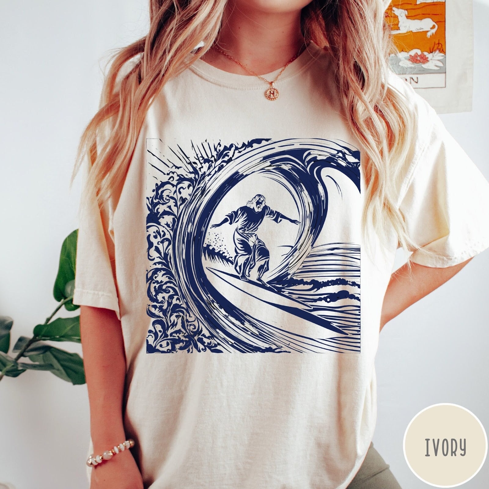 Comfort Colors tee in Ivory featuring graphic style Jesus surfing on a large ocean wave