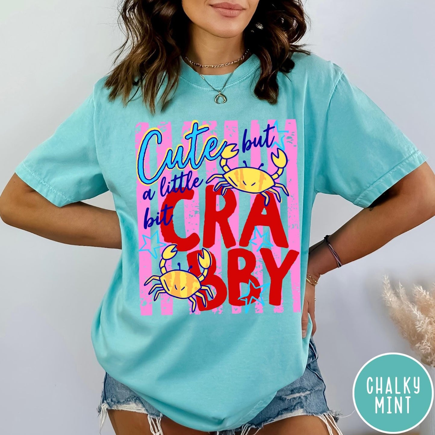 Comfort Colors tee in Chalky Mint featuring graphic design with crabs and text reading Cute but a little bit Crabby