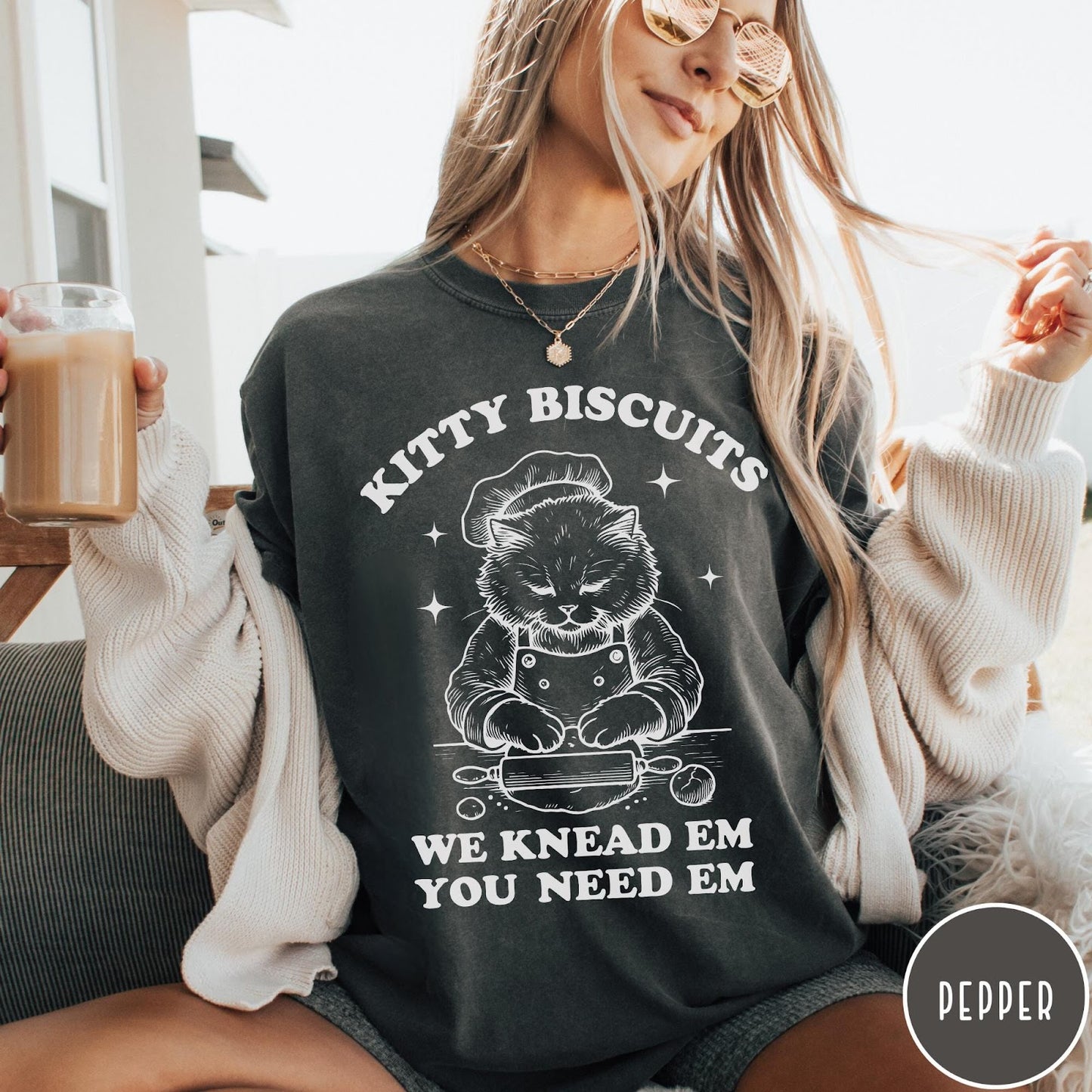 Comfort Colors tee in Pepper featuring cat baking biscuits graphic with chef hat and rolling pin illustration
