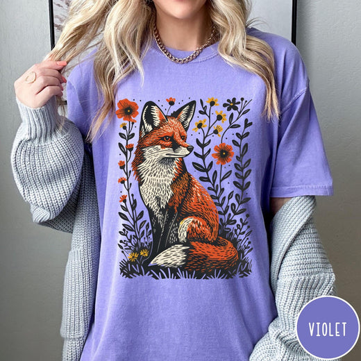 Comfort Colors tee in Violet featuring vintage style graphic of a sitting fox surrounded by orange flowers
