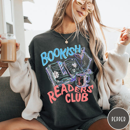 Comfort Colors tee in Pepper featuring illustrated book graphic with a lamp and a coffee mug design