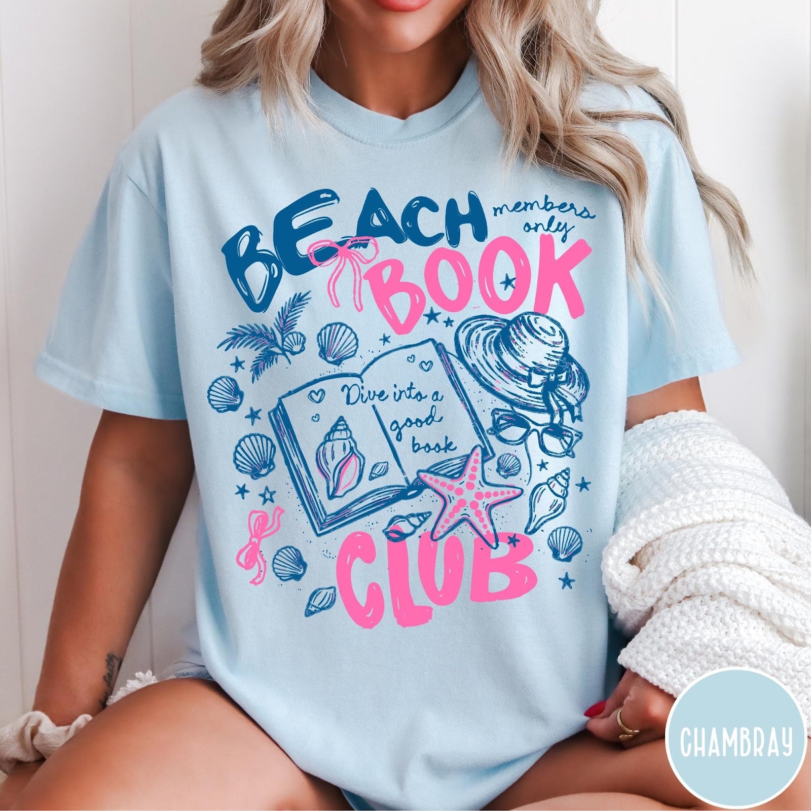 Comfort Colors tee in Chambray featuring beach book club graphic with seashells, starfish, and a sun hat