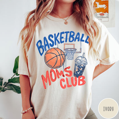 Comfort Colors tee in Ivory featuring basketball mom life graphic with basketball, hoop, and iced coffee drink