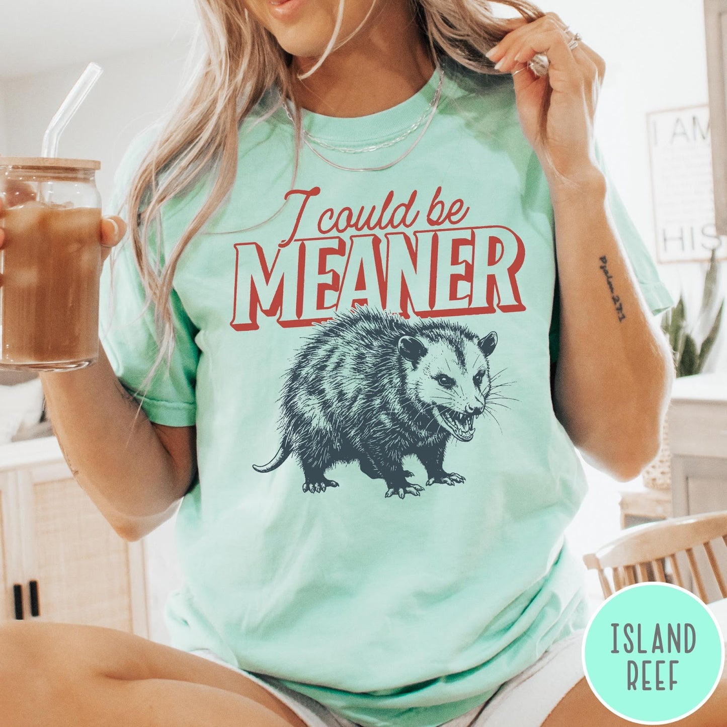 Comfort Colors tee in Island Reef featuring screen printed opossum graphic with text I could be meaner