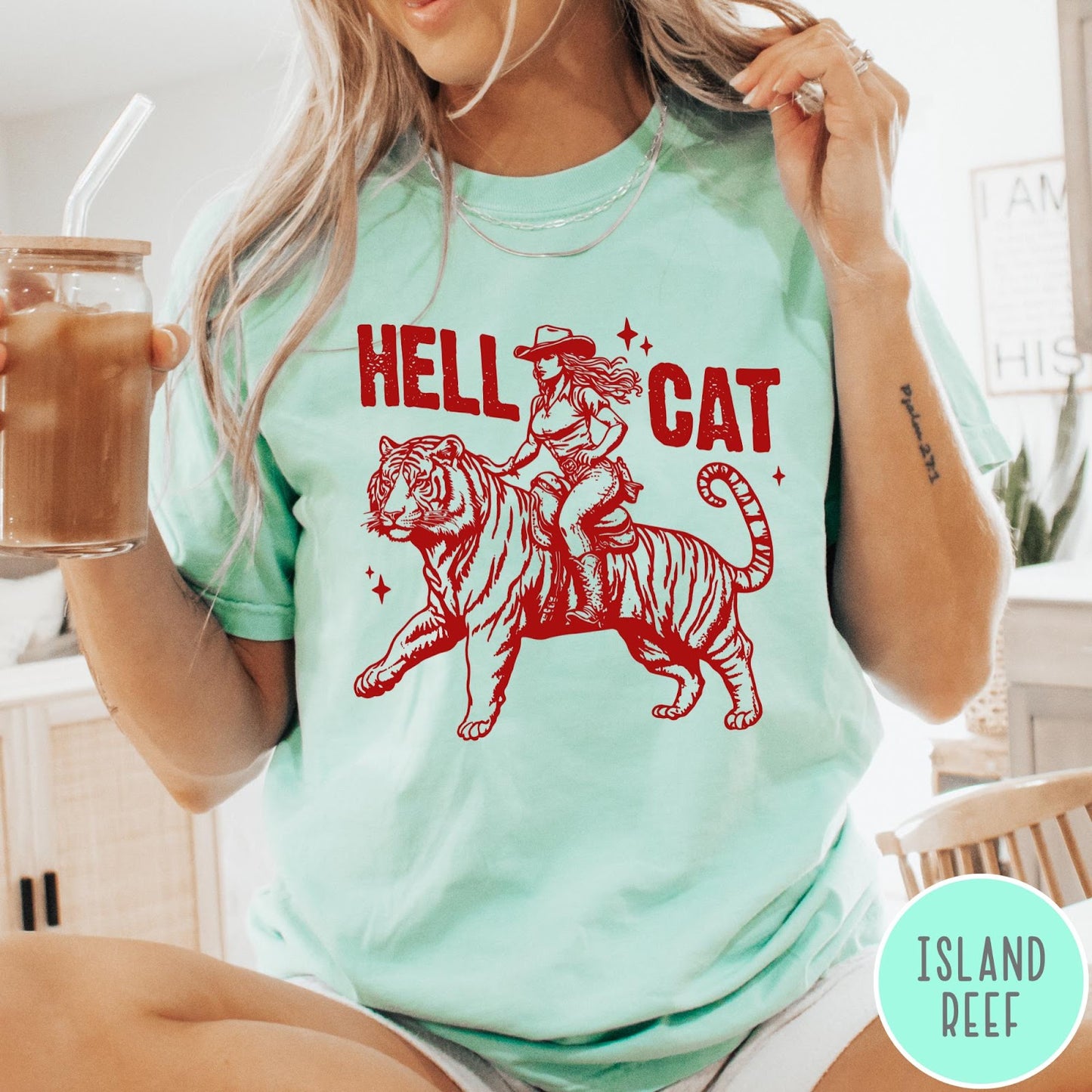 Comfort Colors tee in Island Reef featuring western style graphic of a cowgirl riding a tiger