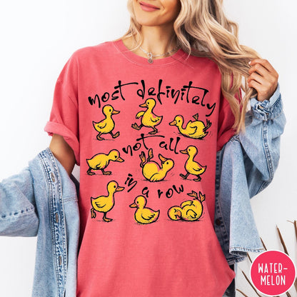 Comfort Colors tee in Watermelon featuring whimsical duck graphic with text most definitely not all in a row.