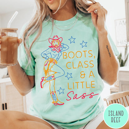 Comfort Colors tee in Island Reef featuring retro cowgirl design with boots and text Boots, Class & A Little Sass