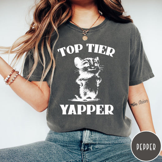 Comfort Colors tee in Pepper featuring graphic design of a chattering animal with Top Tier Yapper text