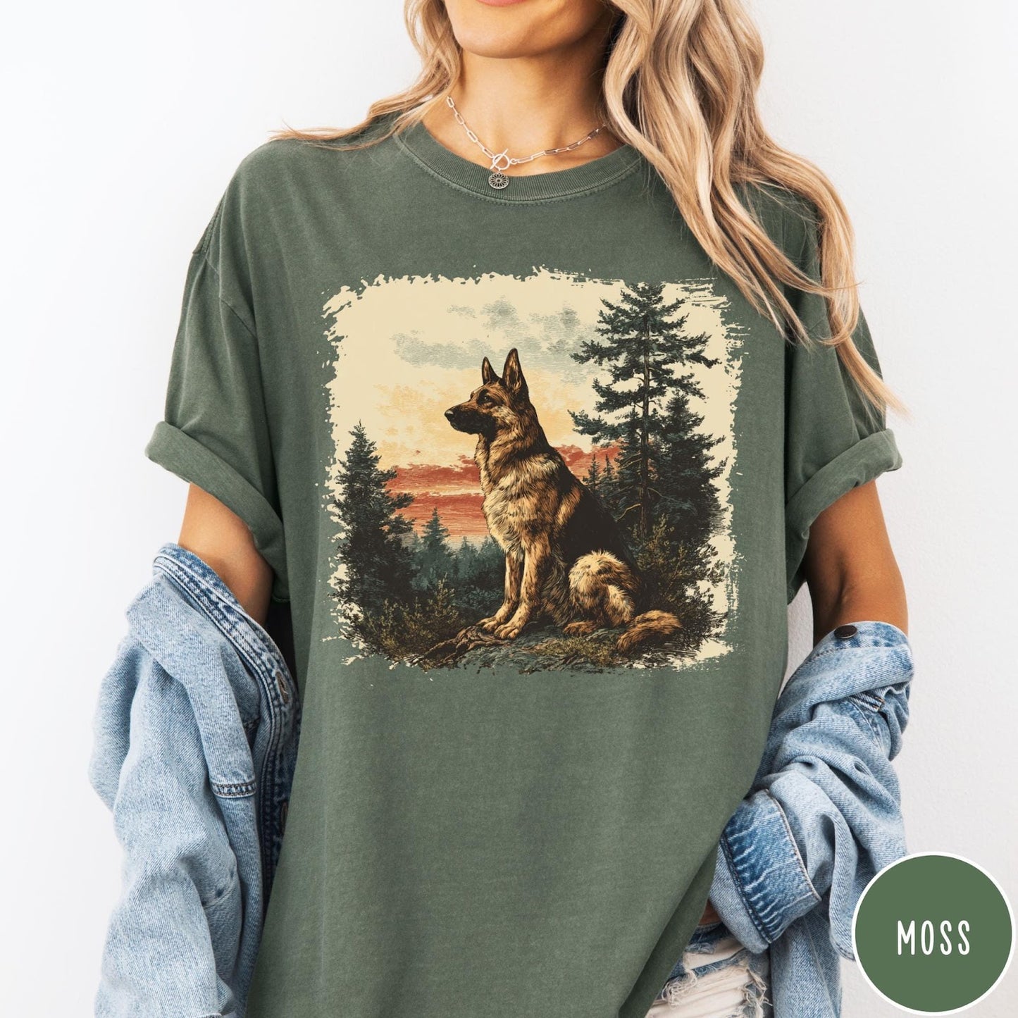 Comfort Colors tee in Moss featuring vintage style graphic of a German Shepherd sitting in a forest