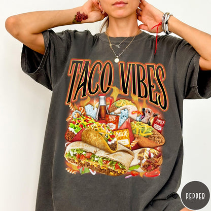 Comfort Colors tee in Pepper featuring retro style graphic with tacos, hot sauce, and a chihuahua dog