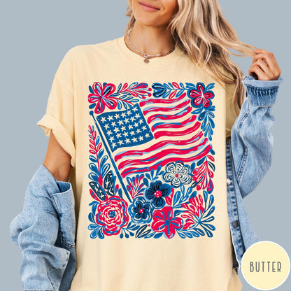 Comfort Colors tee in Butter featuring boho style American flag and floral graphic design