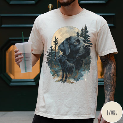 Comfort Colors tee in Ivory featuring nature style graphic of black Labrador dogs in a forest moon scene