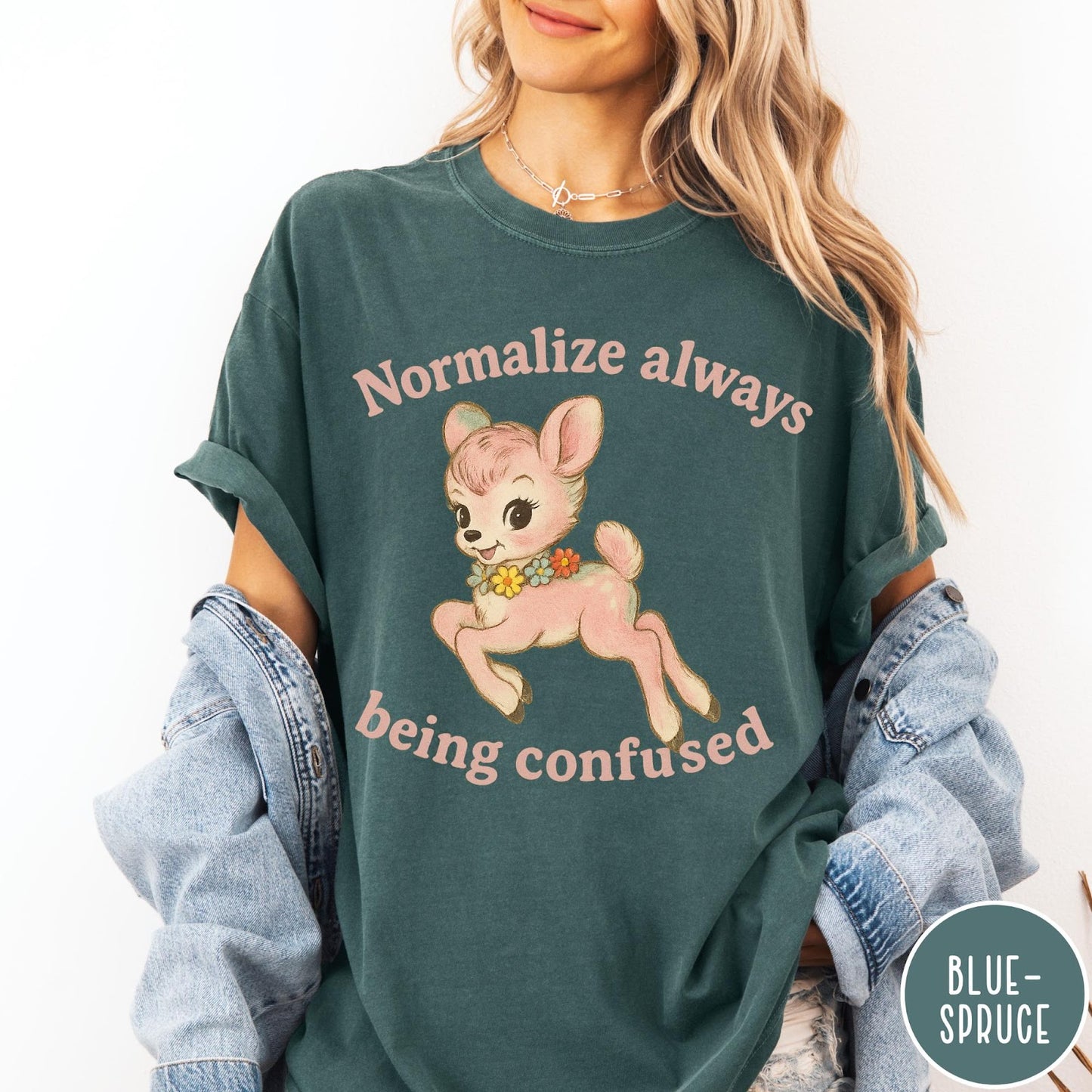 Comfort Colors tee in Blue Spruce featuring vintage style fawn graphic with flowers and Normalize Always Being Confused text