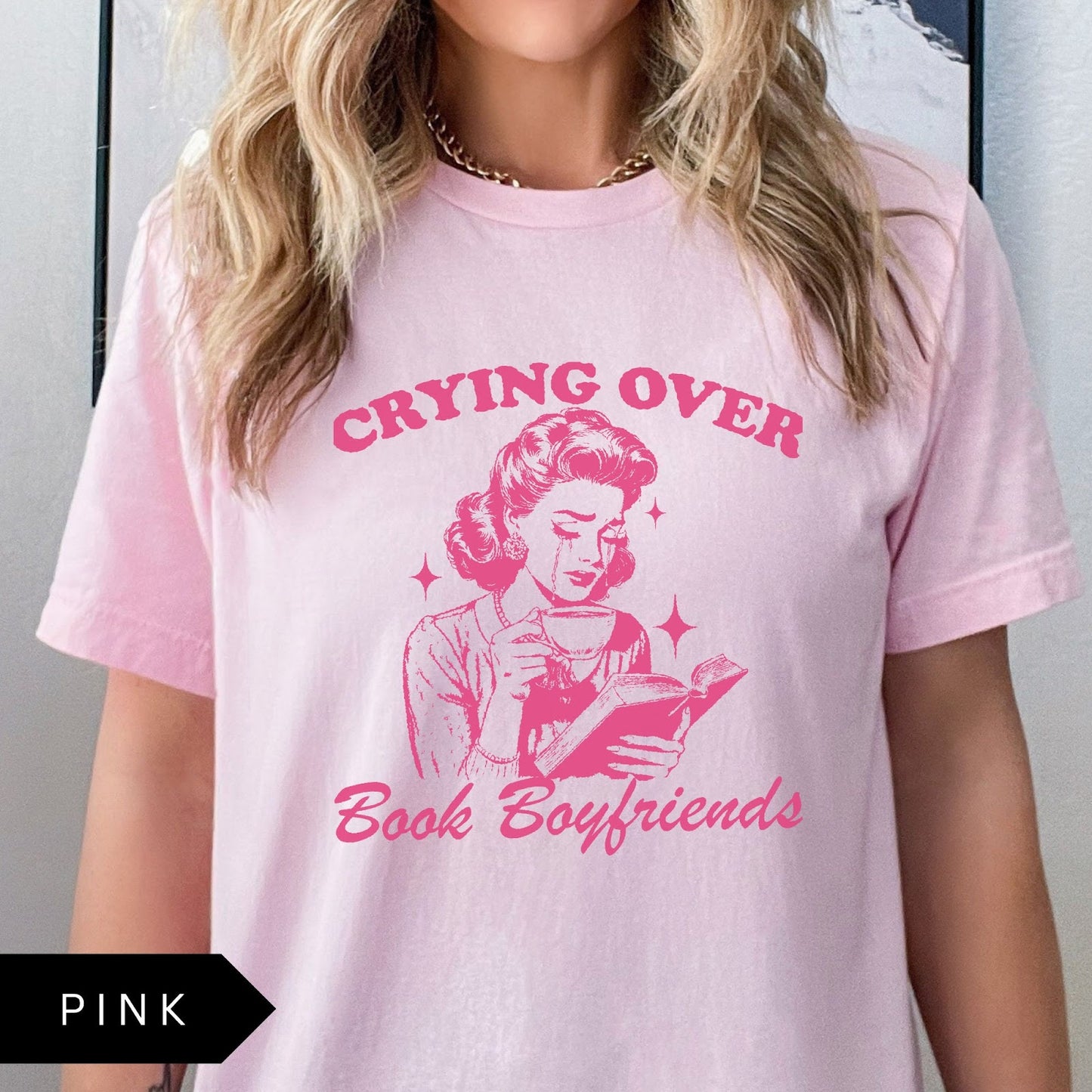 Comfort Colors tee in Pink featuring retro style graphic of a woman crying while reading a book