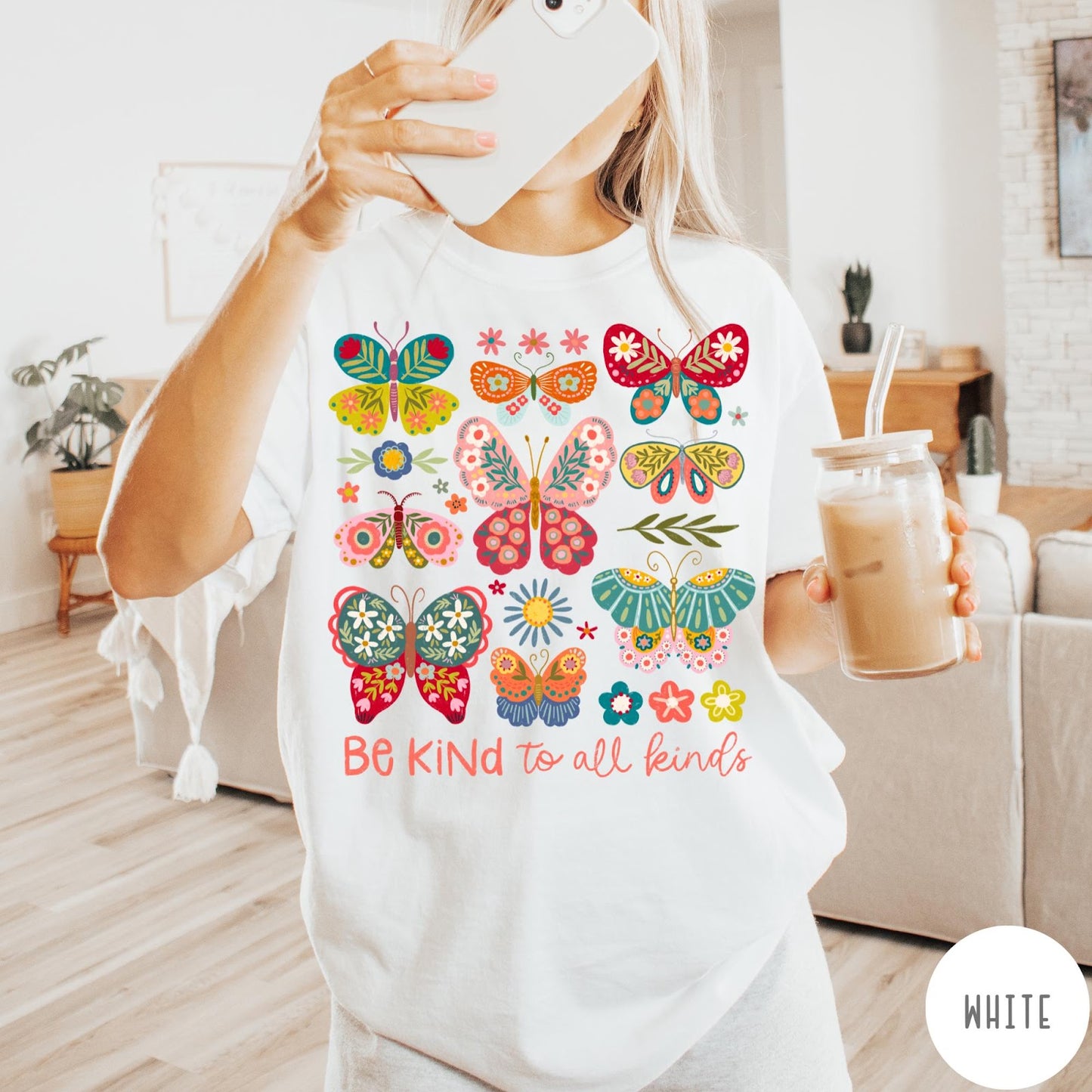 Comfort Colors tee in White featuring colorful butterfly and floral graphic with Be Kind to all kinds text