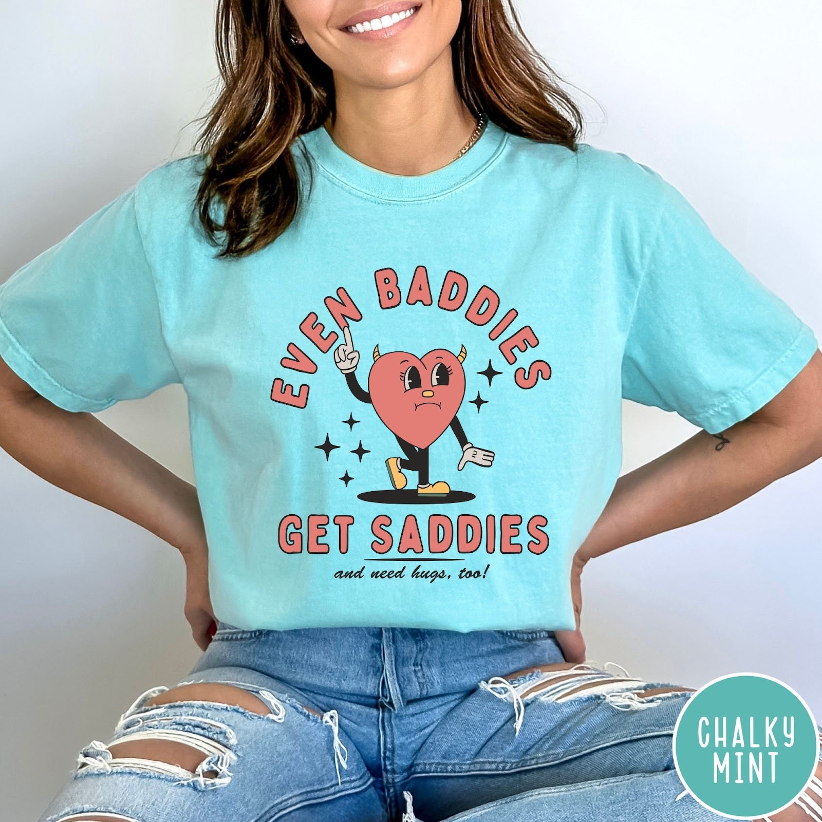 Comfort Colors tee in Chalky Mint featuring retro style graphic of a sad heart character with devil horns