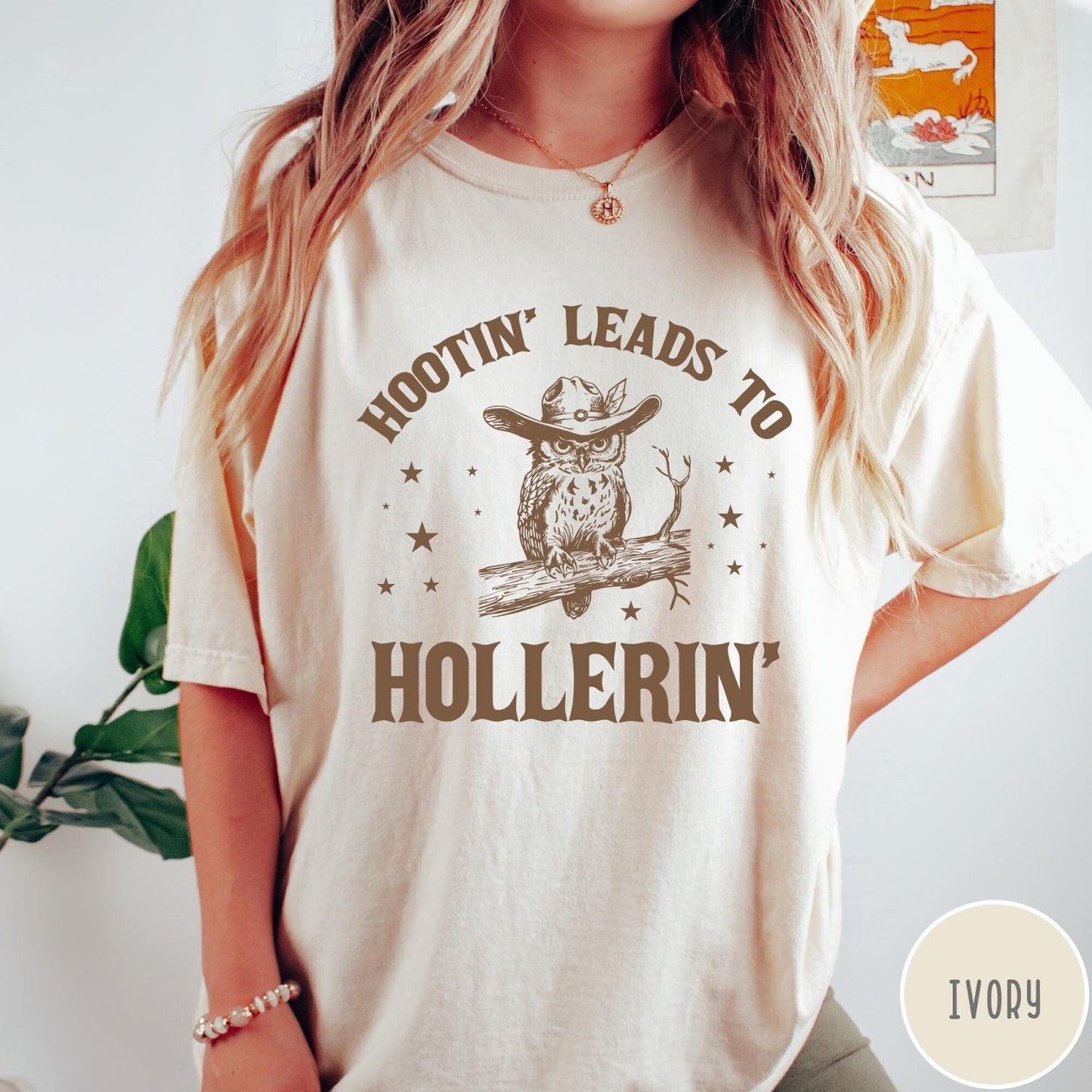 Comfort Colors tee in Ivory featuring western style graphic of an owl wearing a cowboy hat on branch