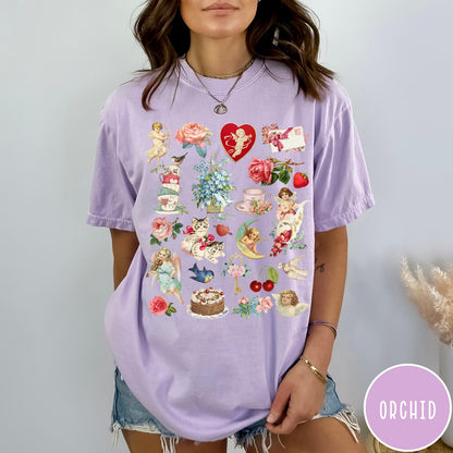 Comfort Colors tee in Orchid featuring vintage Valentine collage graphic with cherubs, flowers, cats, and romantic symbols