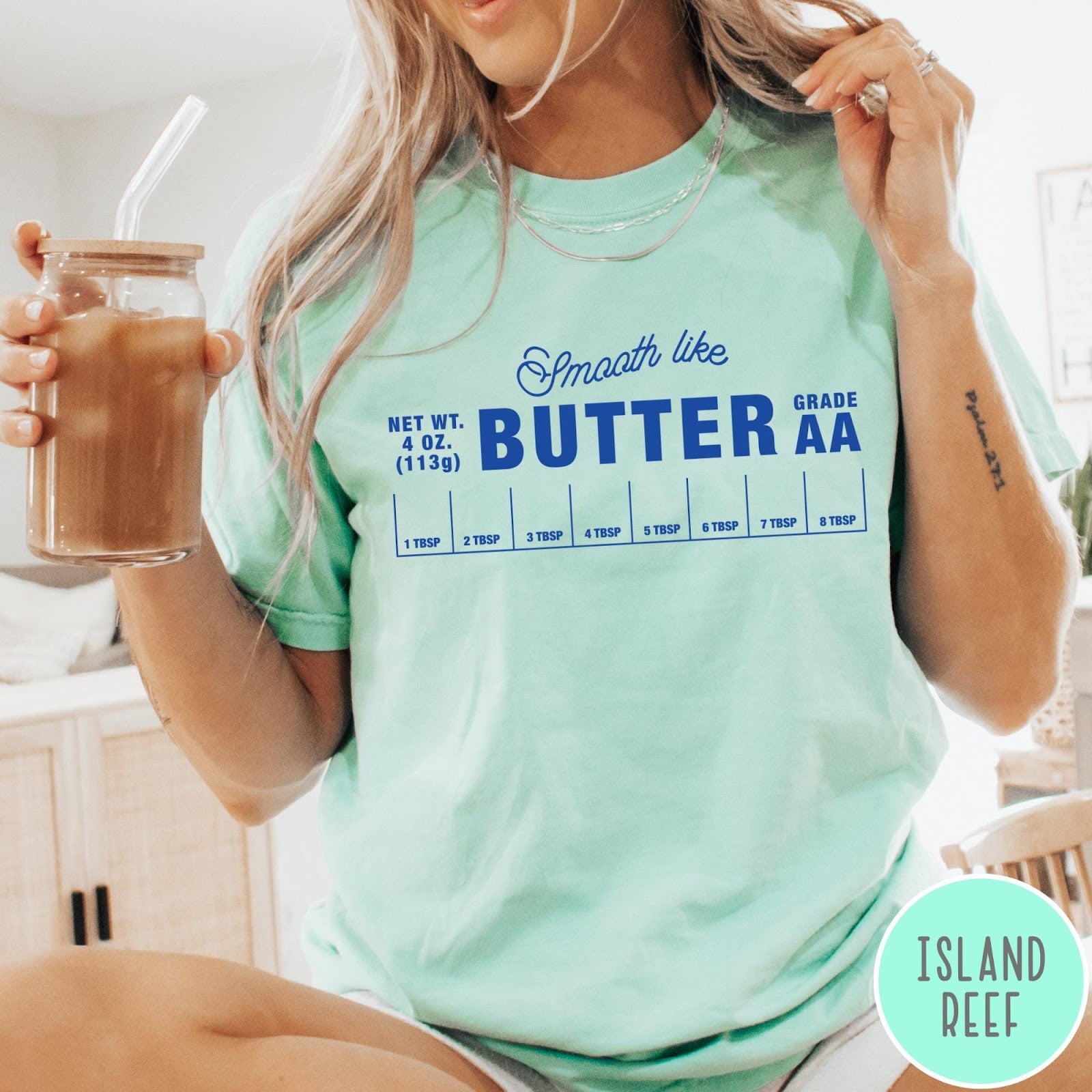 Comfort Colors tee in Island Reef featuring a graphic design of a butter wrapper with measurements and text.