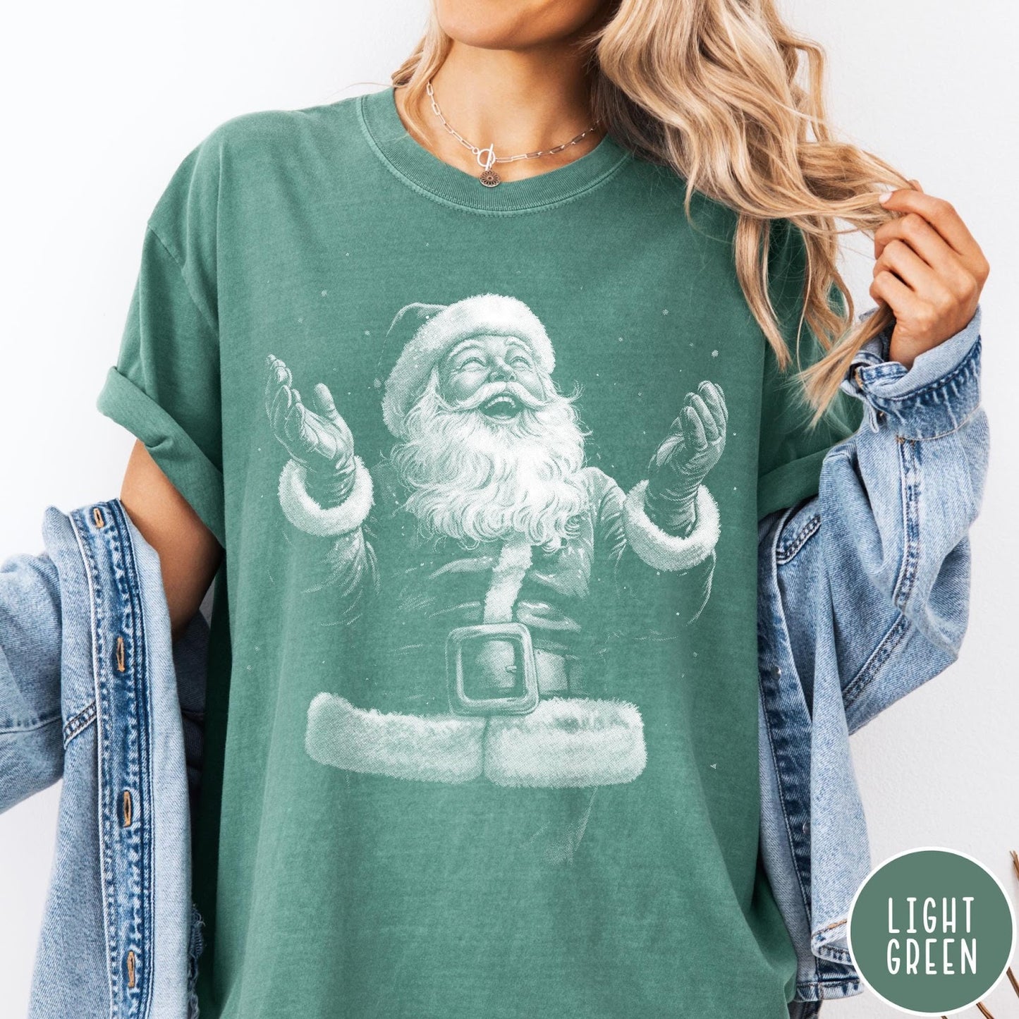 Comfort Colors tee in Light Green featuring vintage style graphic of a laughing Santa Claus with open arms
