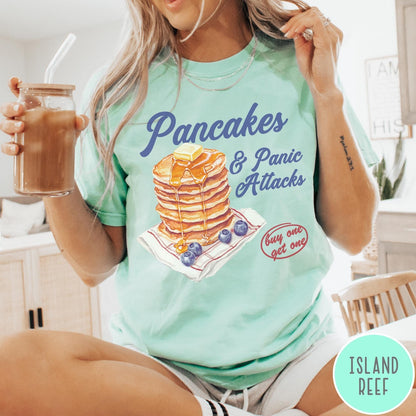 Comfort Colors tee in Island Reef featuring watercolor style graphic of a stack of pancakes with blueberries and syrup