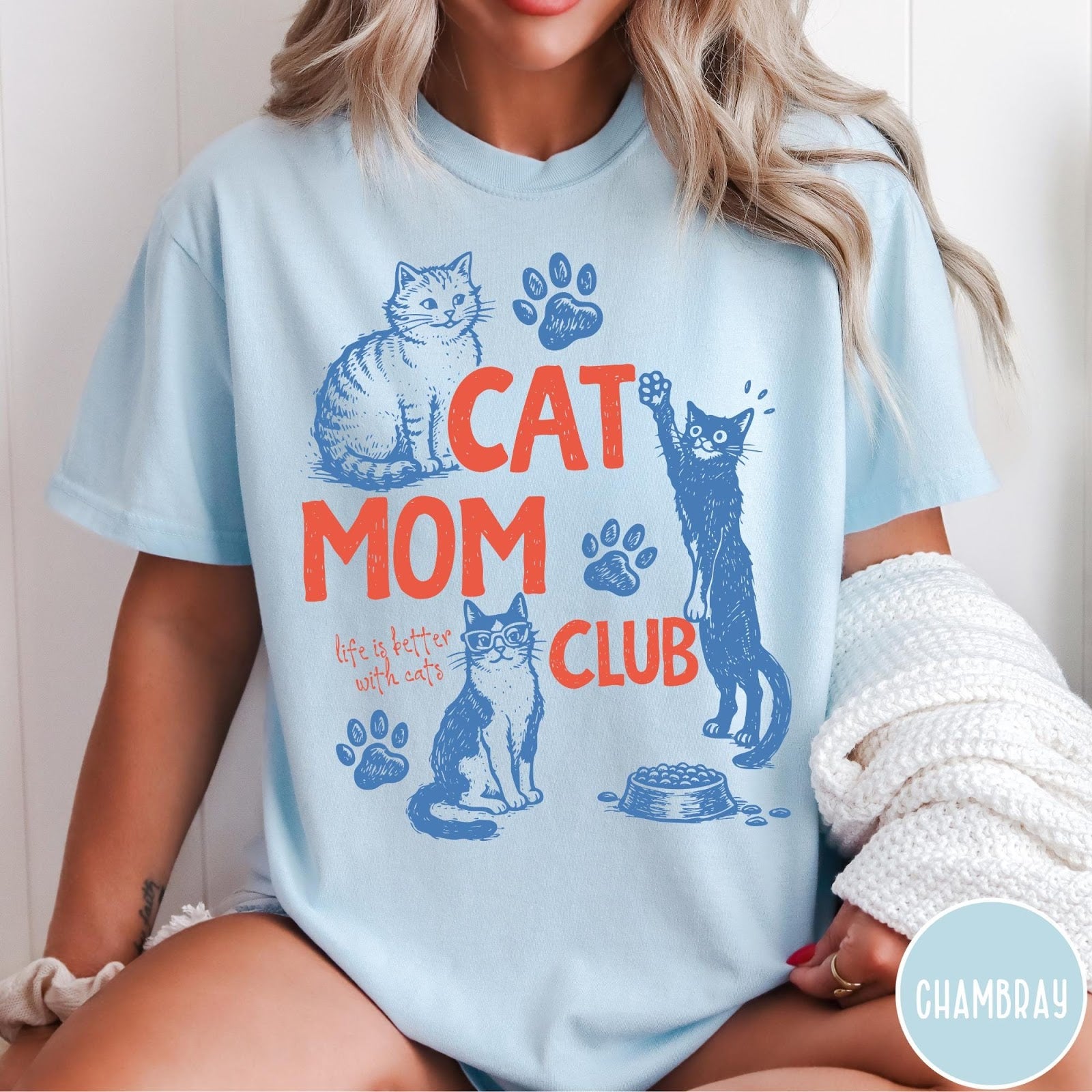 Comfort Colors tee in Chambray featuring graphic illustration of cats, paw prints, and Cat Mom Club text
