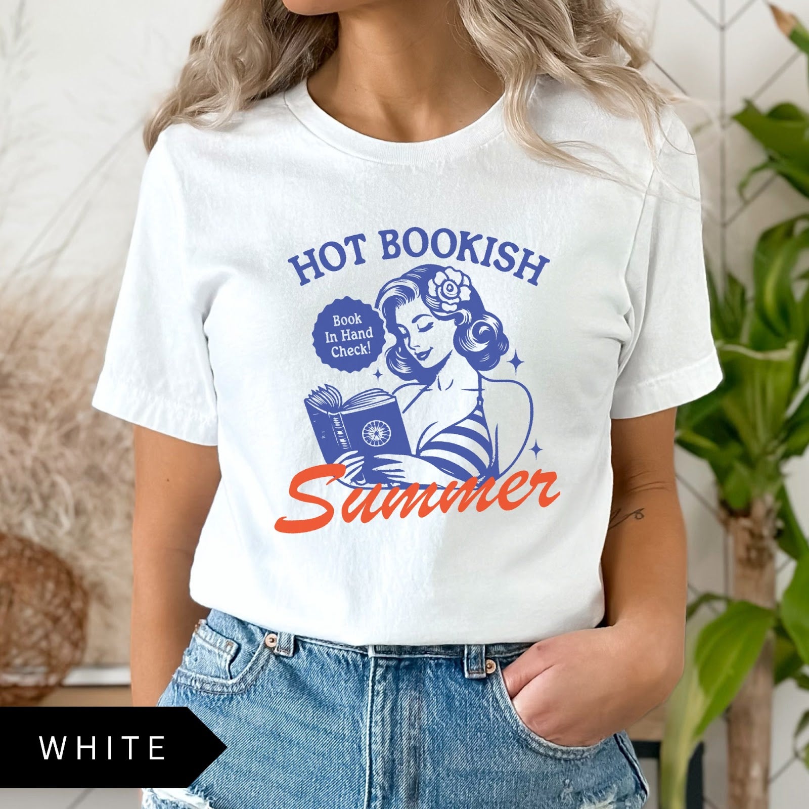Comfort Colors tee in White featuring pinup girl reading a book graphic design with blue and orange ink