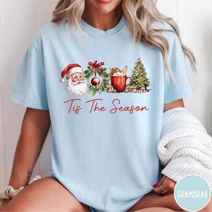 Comfort Colors tee in Chambray featuring holiday design with Santa, wreath, hot cocoa, and Christmas tree graphic