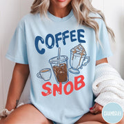 Comfort Colors tee in Chambray featuring coffee themed graphic with iced coffee, espresso, and whipped cream drinks