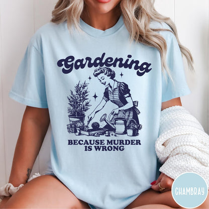 Comfort Colors tee in Chambray featuring vintage style graphic of a woman gardening with text about murder.