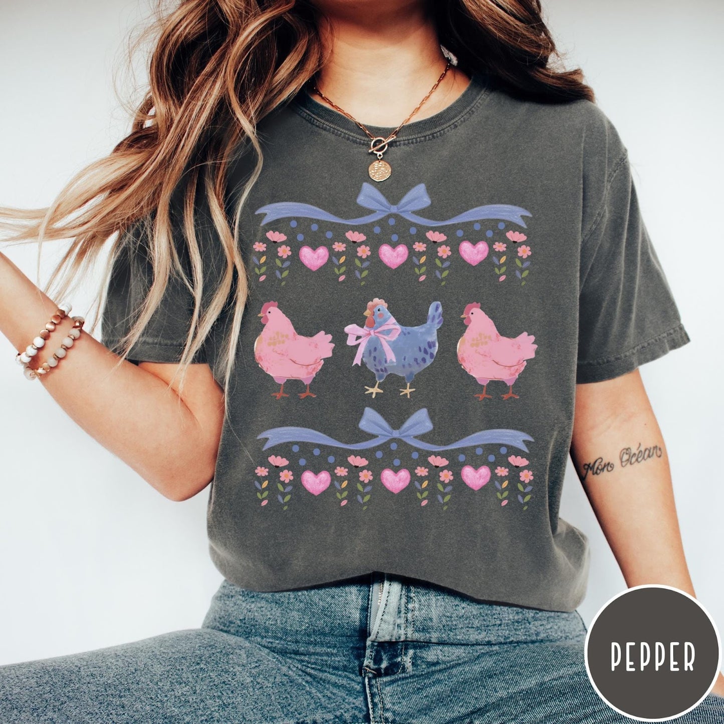 Comfort Colors tee in Pepper featuring vintage style graphic with three chickens, floral accents, and blue bows