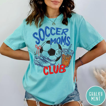 Comfort Colors tee in Chalky Mint featuring soccer mom lifestyle graphic with soccer ball, cleats, and iced coffee
