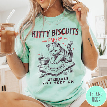 Comfort Colors tee in Island Reef featuring vintage style graphic of a cat baking biscuits on board