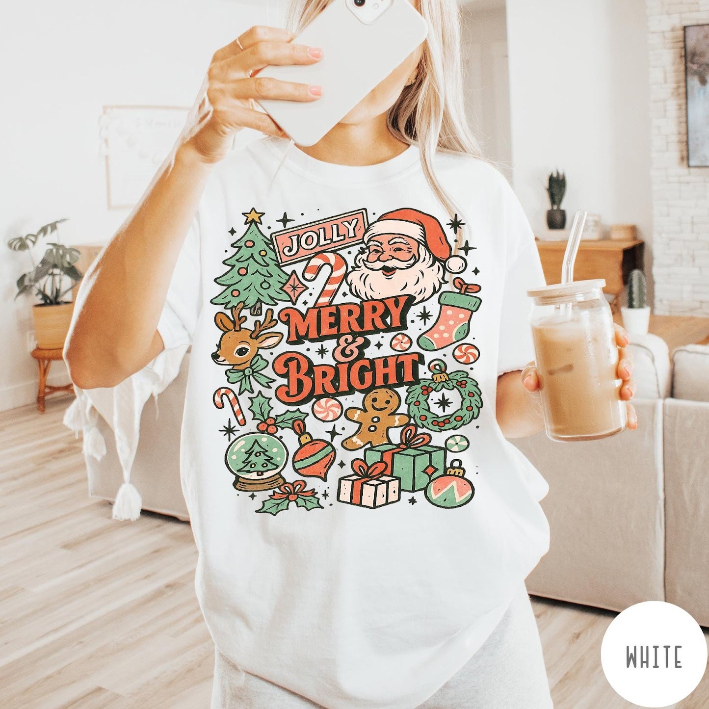 Comfort Colors tee in White featuring retro holiday style graphic with Santa, reindeer, and Christmas icons