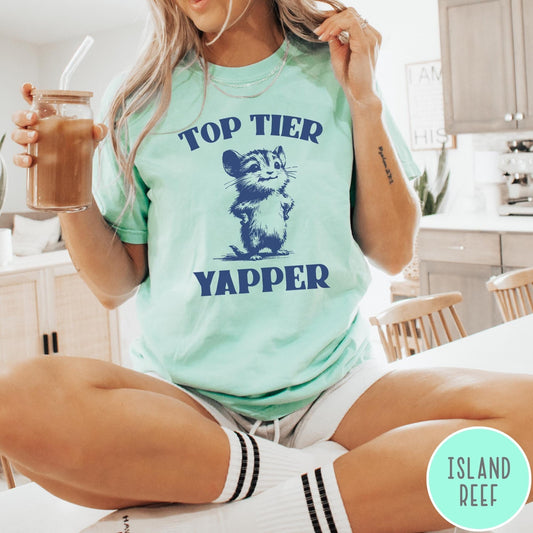Comfort Colors tee in Island Reef featuring graphic design of a chattering animal with Top Tier Yapper text
