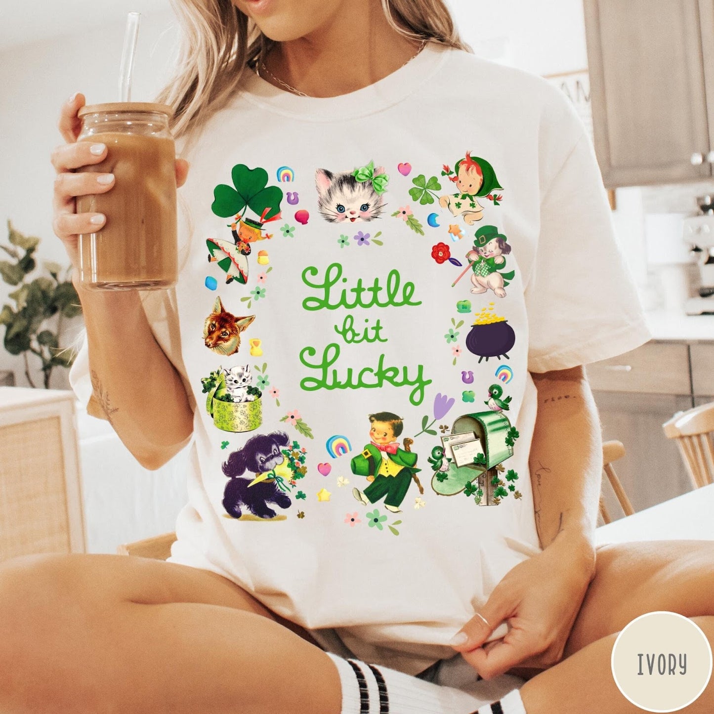 Comfort Colors tee in Ivory featuring St. Patrick's Day collage with kittens, leprechauns, and festive holiday icons