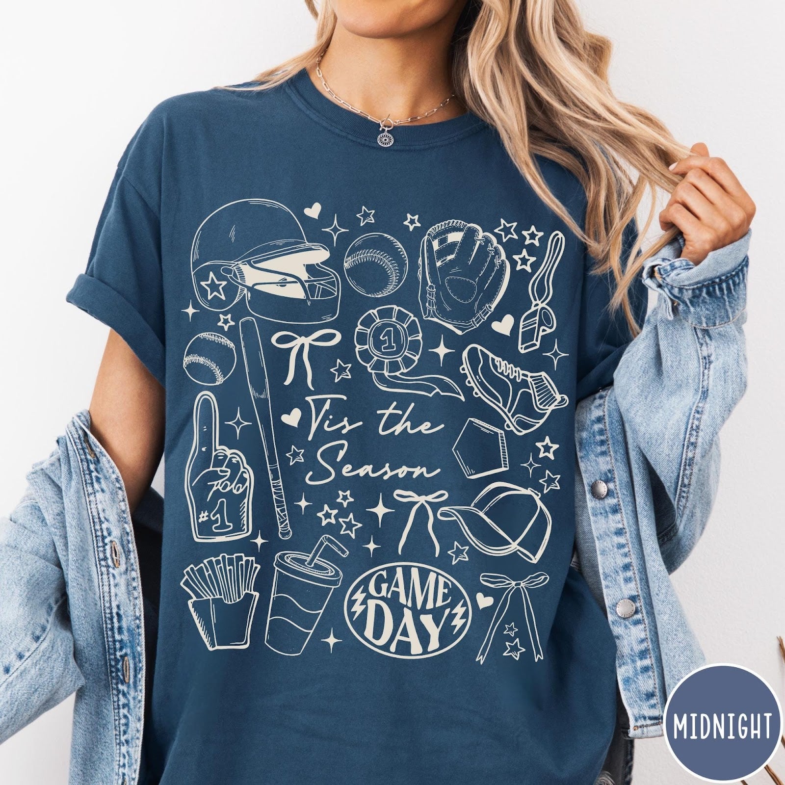 Comfort Colors tee in Midnight featuring baseball game day graphic with helmet, bat, ball, and snacks.