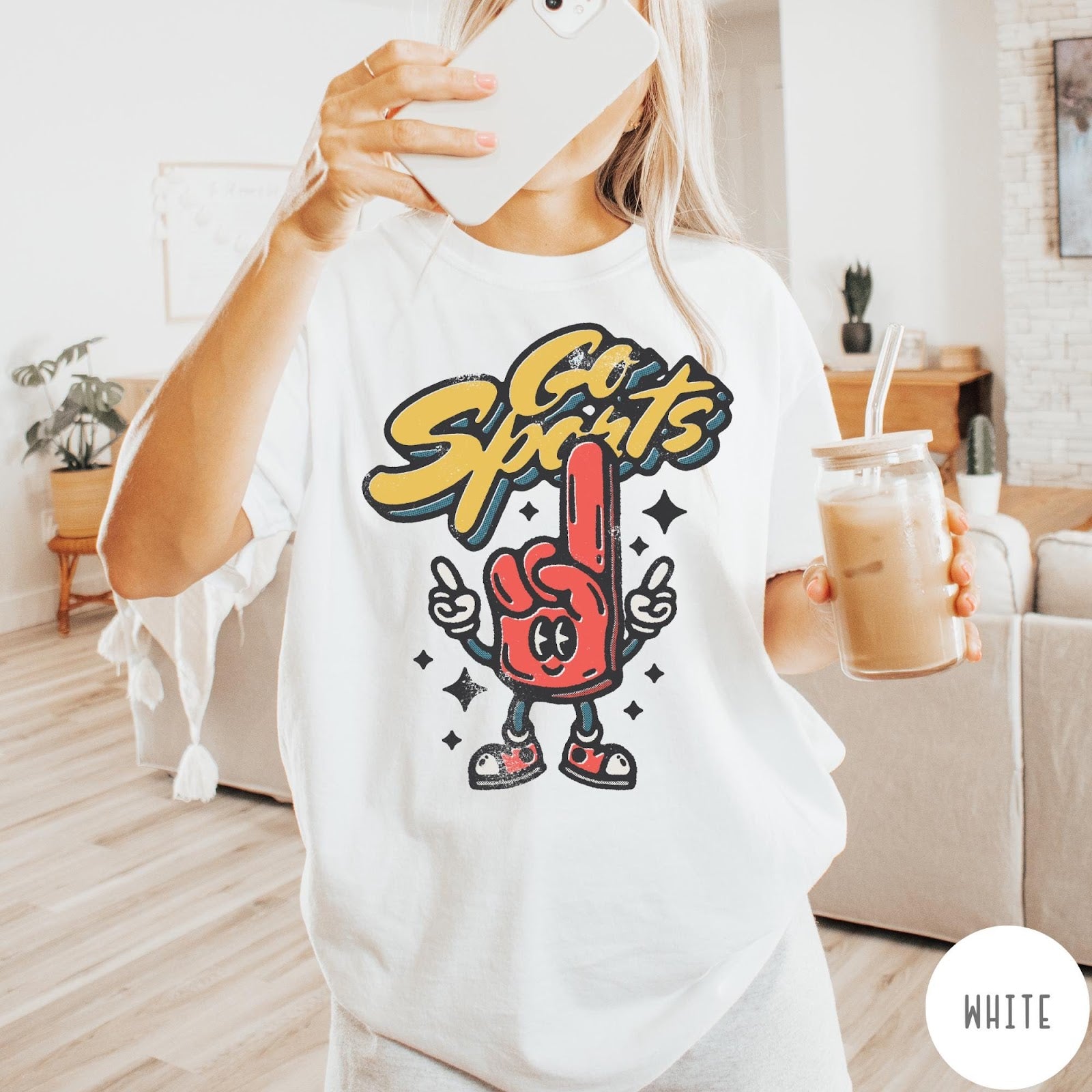 Comfort Colors tee in White featuring retro mascot design with a red foam finger character and text