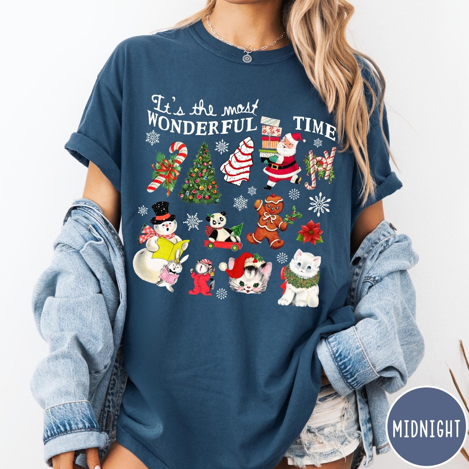 Comfort Colors tee in Midnight featuring Christmas collage graphic with Santa, snowman, animals, and holiday icons