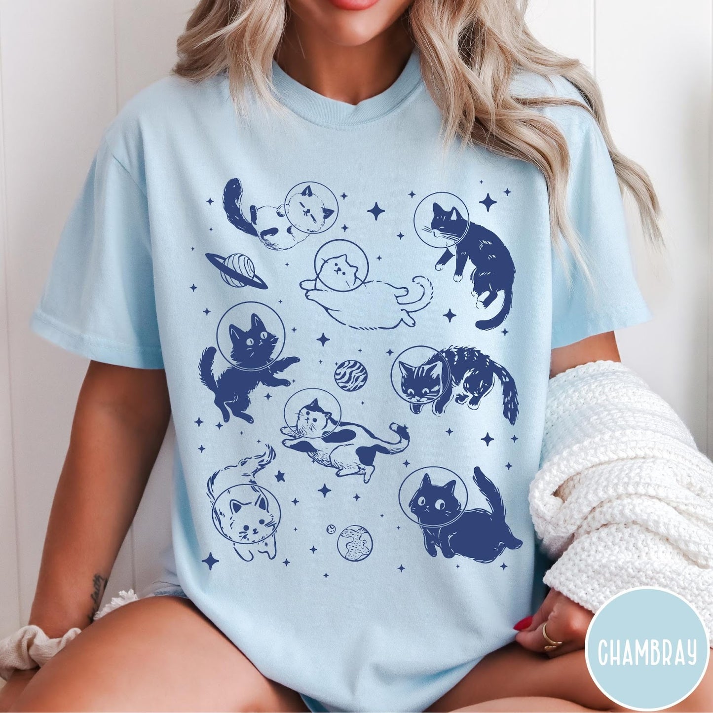 Comfort Colors tee in Chambray featuring whimsical space style graphic with multiple cats floating in space helmets