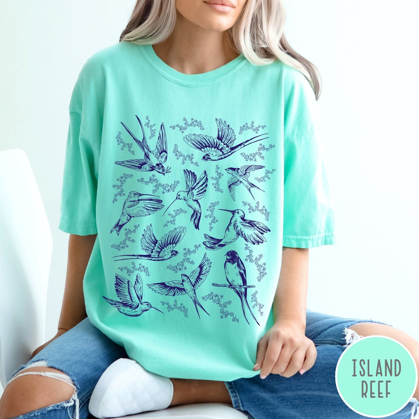 Comfort Colors tee in Island Reef featuring vintage bird tattoo style graphic with various birds and flowers