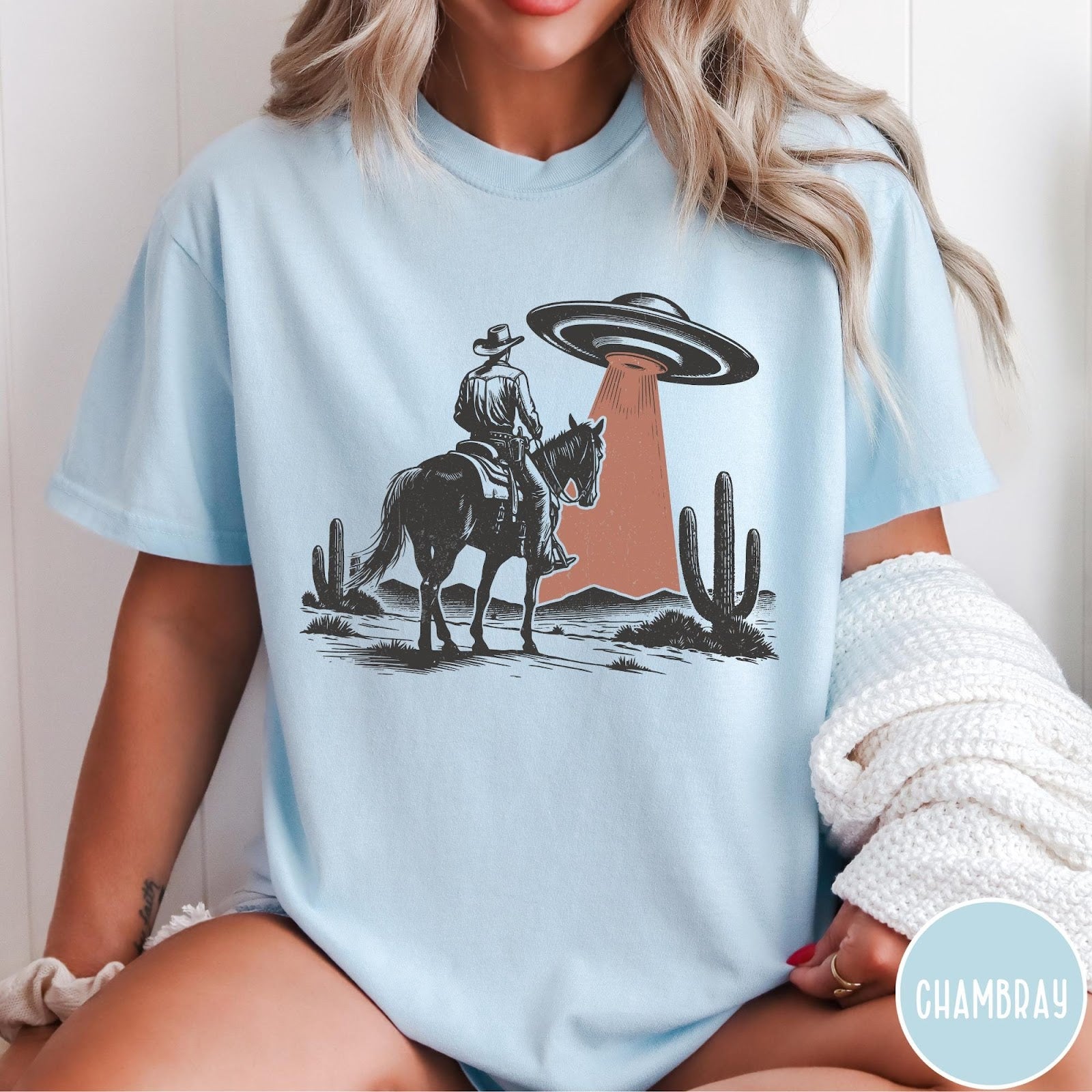 Comfort Colors tee in Chambray featuring western style graphic of a cowboy on horseback under a UFO