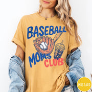 Comfort Colors tee in Mustard featuring baseball mom graphic with a glove, ball, bat, and iced coffee