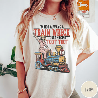 Comfort Colors tee in Ivory featuring vintage style pin-up woman sitting on a steam train graphic