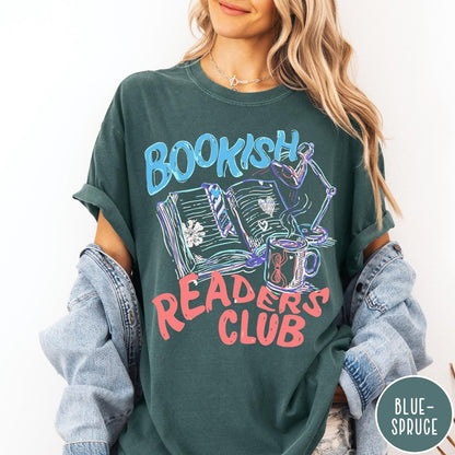 Comfort Colors tee in Blue Spruce featuring bookish reading graphic with open book, lamp, and coffee mug