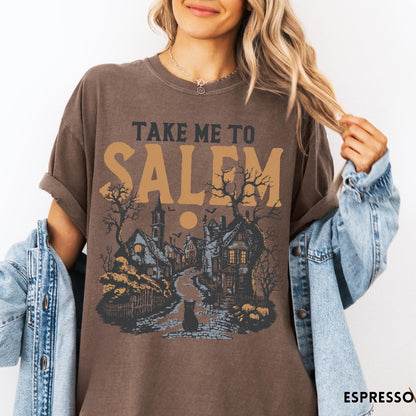 Comfort Colors tee in Espresso featuring vintage style Salem town scene with black cat and pumpkins