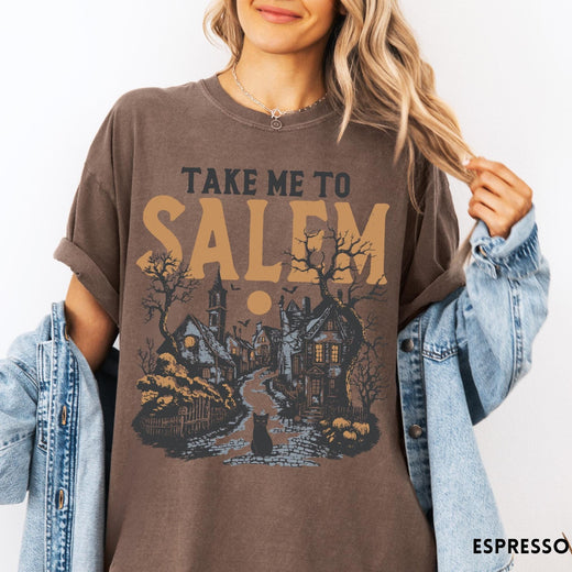 Comfort Colors tee in Espresso featuring vintage style Salem town scene with black cat and pumpkins