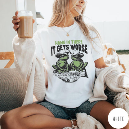 Comfort Colors tee in White featuring vintage style graphic of two frogs wearing cowboy hats on leaf